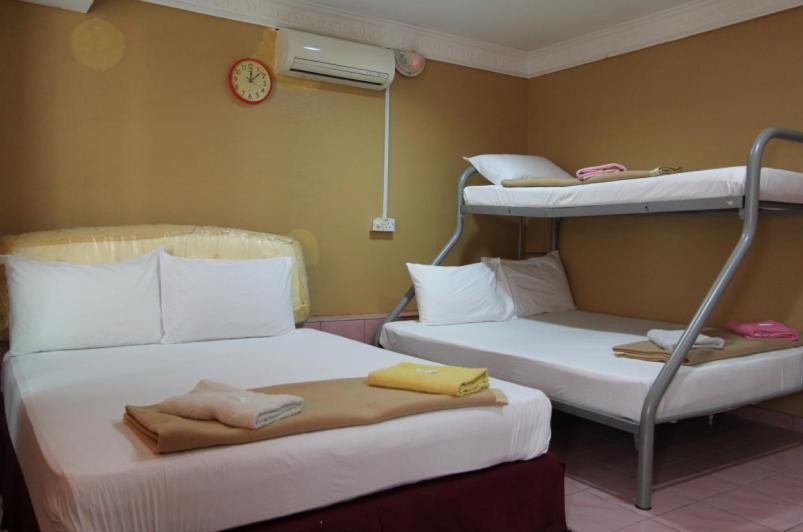 New Wave Hotel Sdn Bhd - Medan Batu Caves Quarto foto
